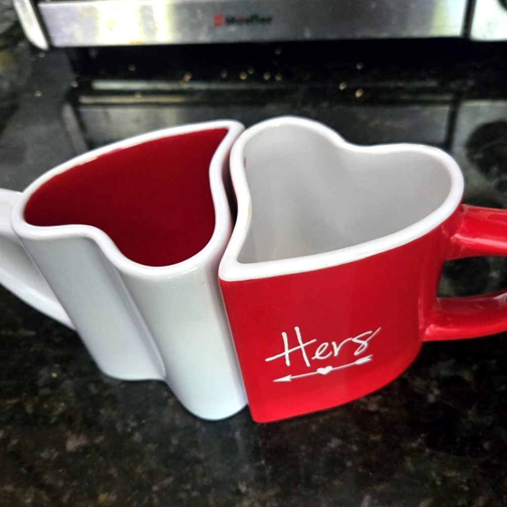 Adorable his and hers heart mugs.